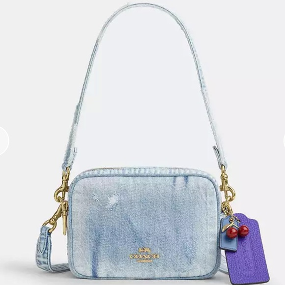 Coach Handbags - Coach Mini Carey Crossbody Bag In Loved Denim With Charms